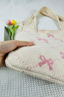 Beige Knit Shoulder Bag with Pink Bow Accents-handbags-Rae Collective, Women's Online Fashion Boutique Located in Phoenix, Arizona (Scottsdale Area)