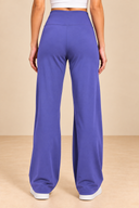 Back View in Purple Wide-Leg Pants.png