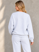 Blonde Woman in Gray Loungewear.png