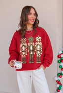 Festive Nutcracker Sweater and Reindeer Mug.png