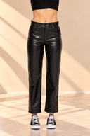 Minimalist Black Leather Fashion Look.png