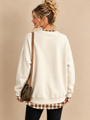 Plaid Trim Sweatshirt Studio Portrait.png