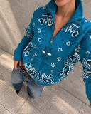 Turquoise Paisley Sweater Street Selfie.png